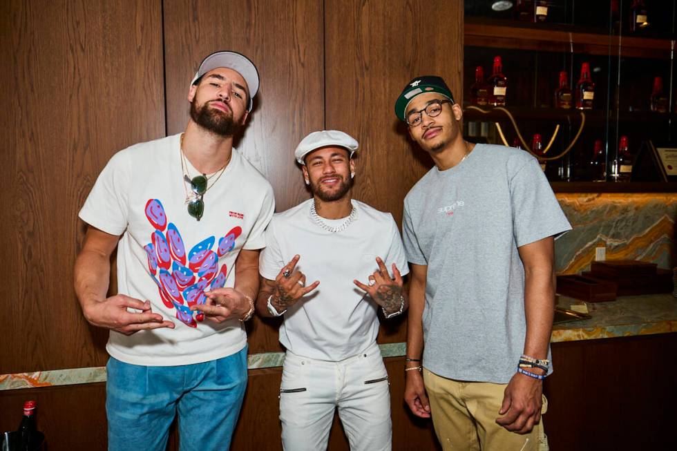 Klay Thompson, far left, and Jordan Poole of the Golden State Warriors are shown with soccer st ...