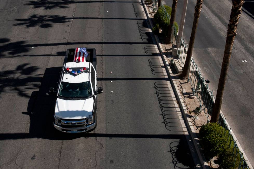 The funeral procession for Las Vegas police Detective Justin Terry heads south on Las Vegas Bou ...