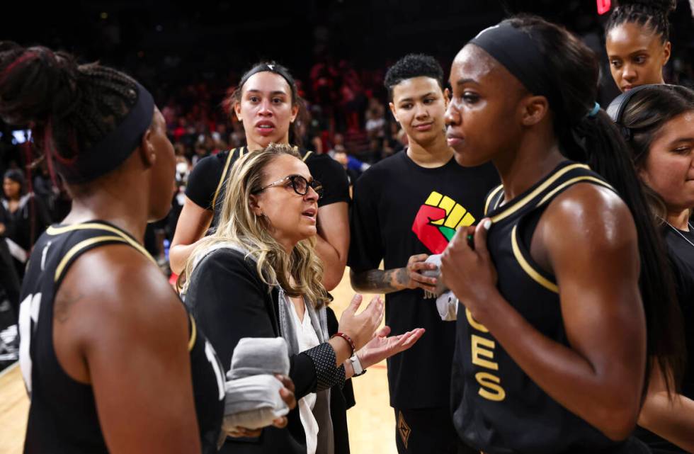 Las Vegas Aces head coach Becky Hammon talks with her players after they defeated the Minnesota ...