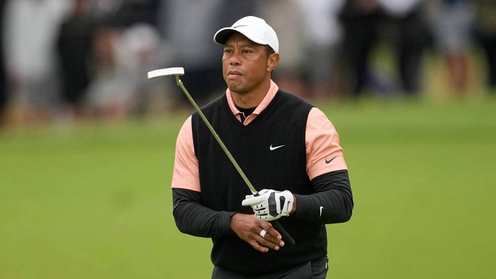Tiger Woods plays during the third round of the PGA Championship golf tournament at Southern Hi ...