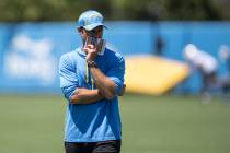 Los Angeles Chargers head coach Brandon Staley watches his players during an NFL football pract ...