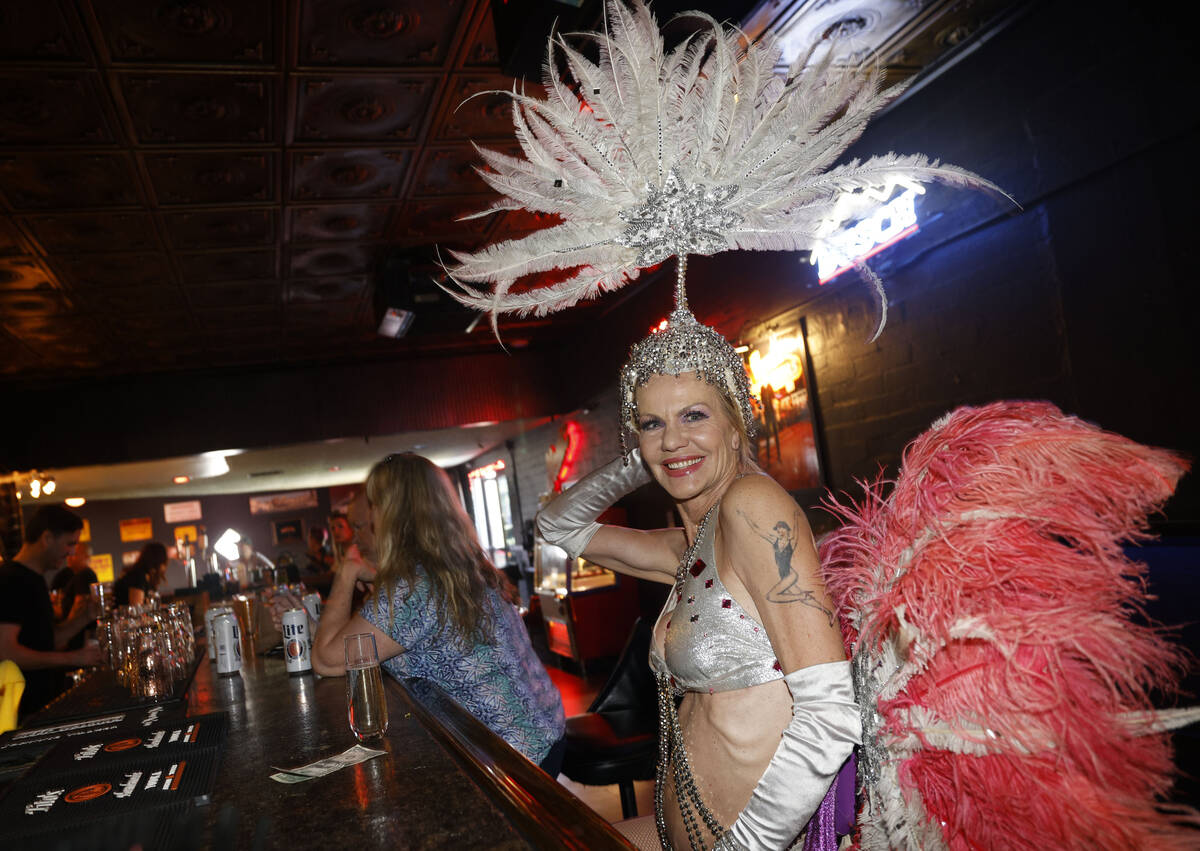 Showgirl Troy Stern stops by Atomic Liquors before her gig, Saturday, June 18, 2022, in Las Veg ...