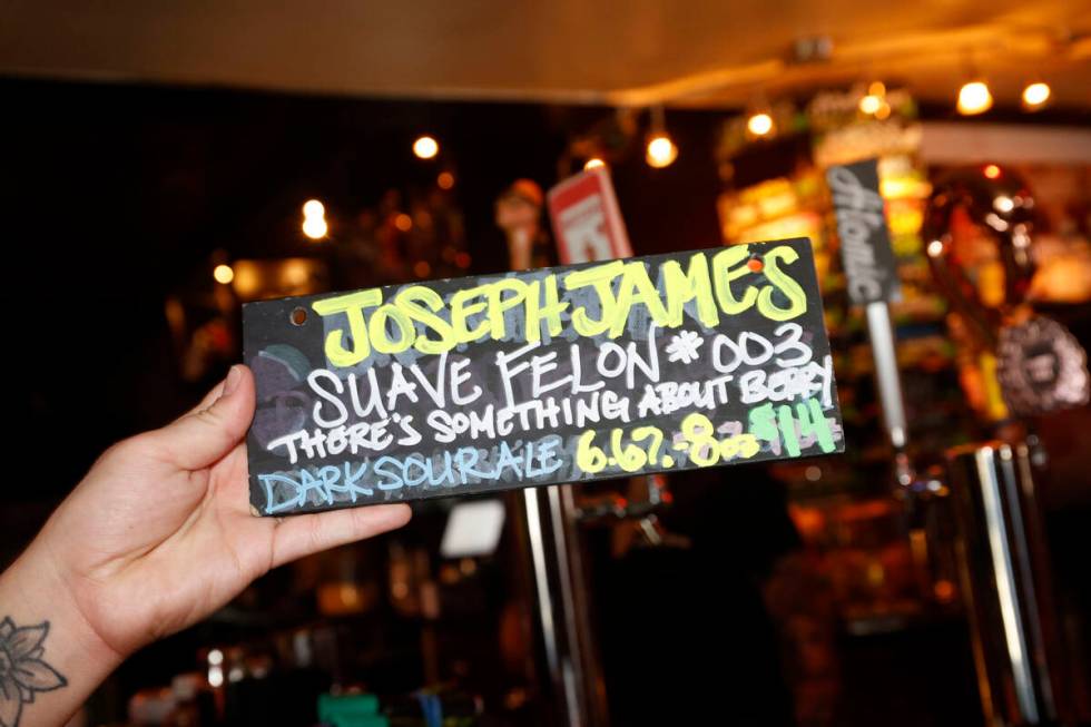 A new tag of Joseph James Suave Felon #003 is seen at Atomic Liquors, Saturday, June 18, 2022, ...