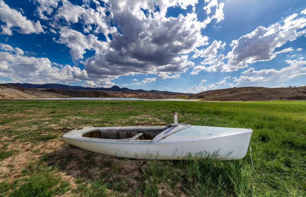 A boat is left stranded on the shoreline as water levels continue to drop at the Lake Mead Nati ...