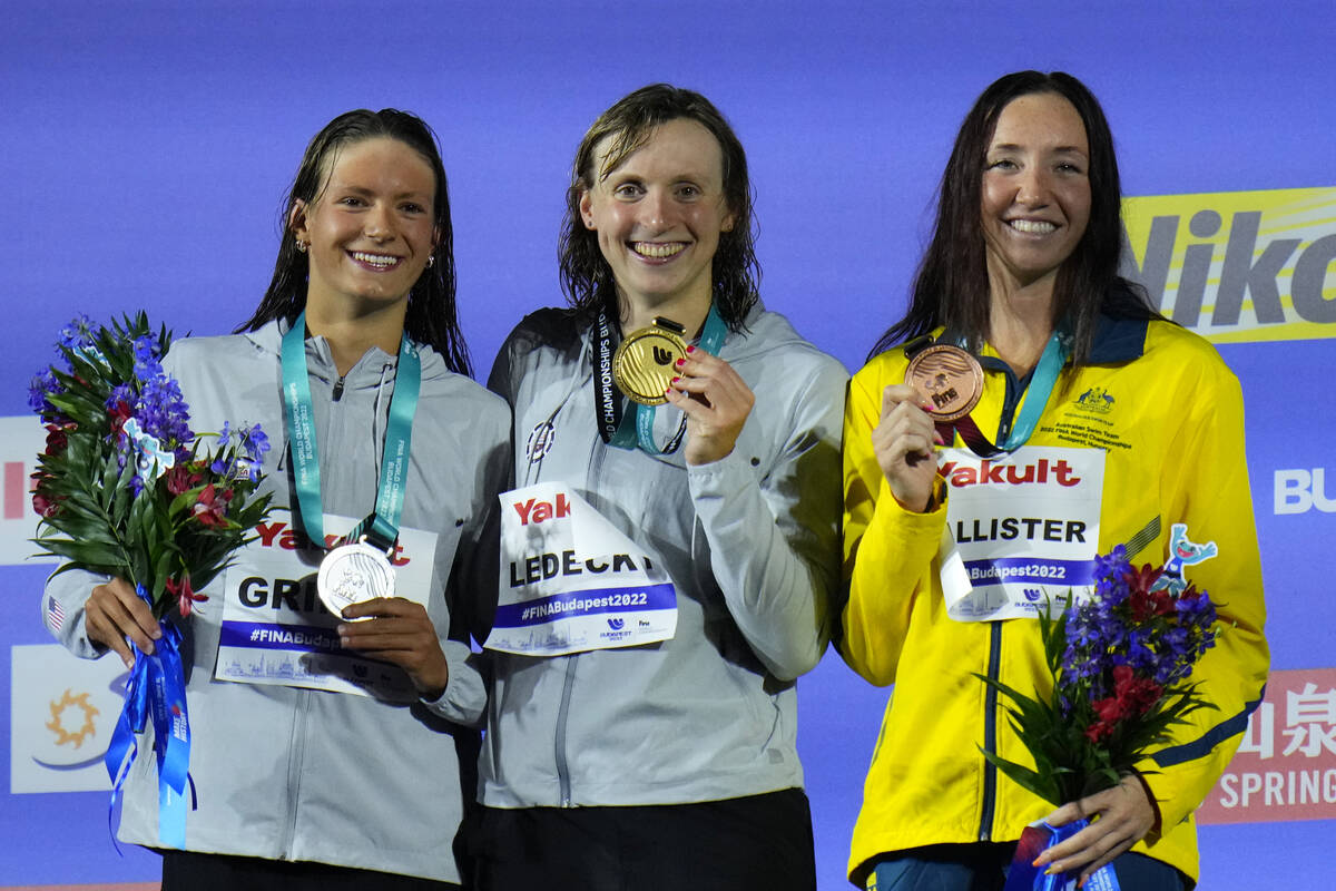 Silver medalist Katie Grimes of the United States and Las Vegas, gold medalist Katie Ledecky of ...