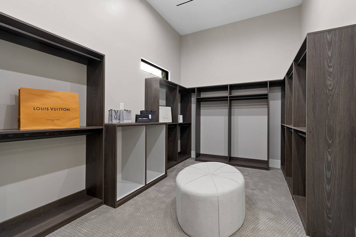 One of two master closets. (Darin Marques Group)