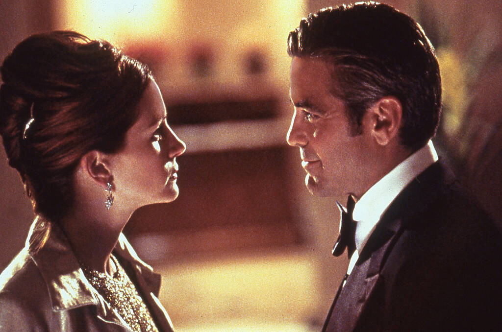 Julia Roberts and George Clooney star in "Ocean's 11." (Warner Bros.)