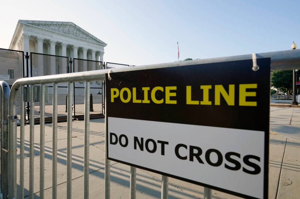 The Supreme Court, Friday, June 24, 2022, in Washington. (AP Photo/Steve Helber)