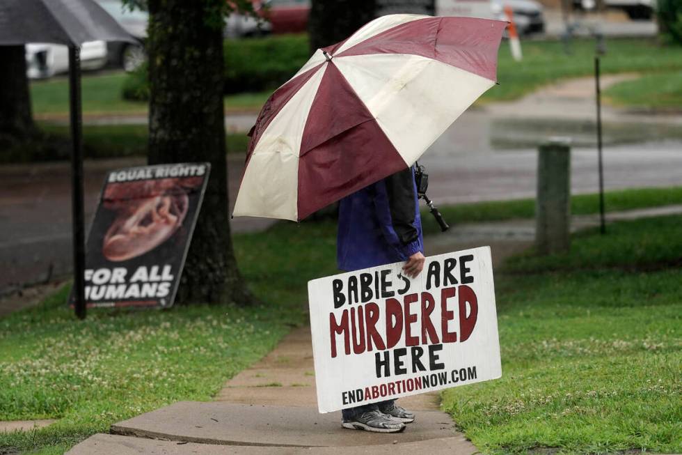 Anti-abortion advocate Clifton Boje, from Bonner Springs, Kan., stands outside the Planned Pare ...