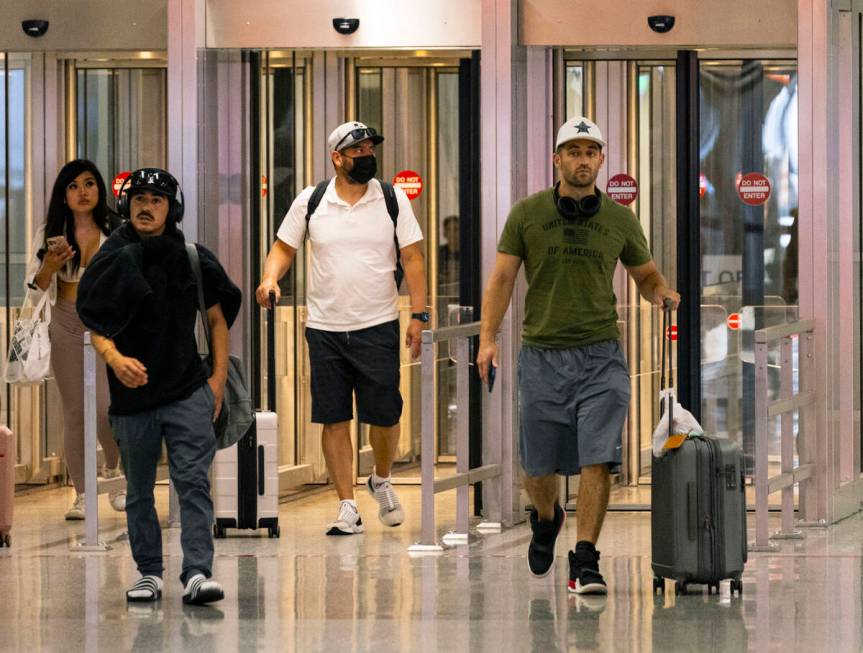 Passengers arrive at Terminal 3 at Harry Reid International Airport on Friday, June 24, 2022, i ...