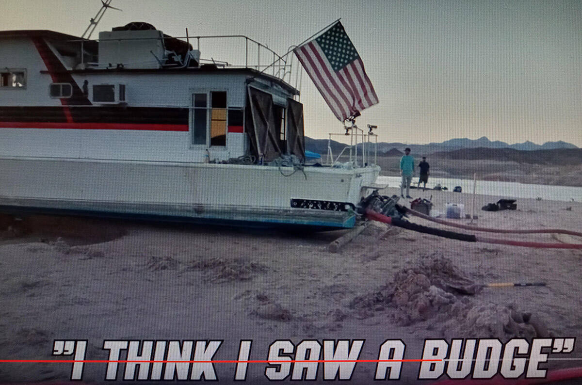 The houseboat/residence of Craig Miller before it was pulled off the sand at Lake Mead on Thurs ...
