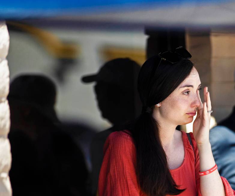Olivia French wipes tears from her eyes during the anti-abortion rally “Honoring our For ...