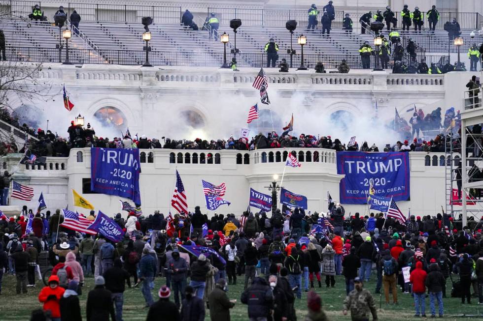 FILE - Violent insurrectionists, loyal to President Donald Trump, storm the Capitol in Washingt ...