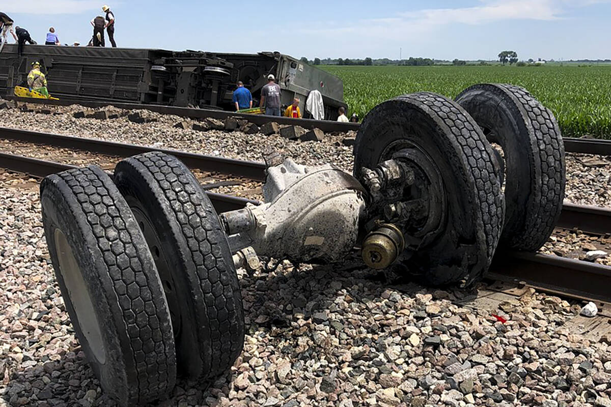 In this photo provided by Dax McDonald, debris sits near railroad tracks after an Amtrak passen ...