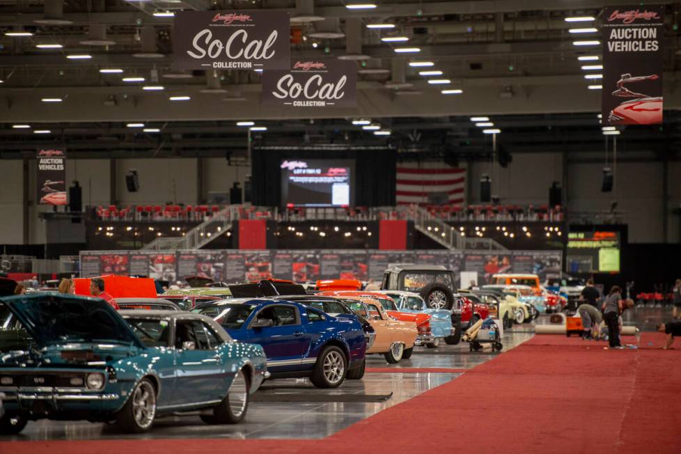 Cars line the convention hall floor for the Barrett-Jackson car auction at the Las Vegas Conven ...