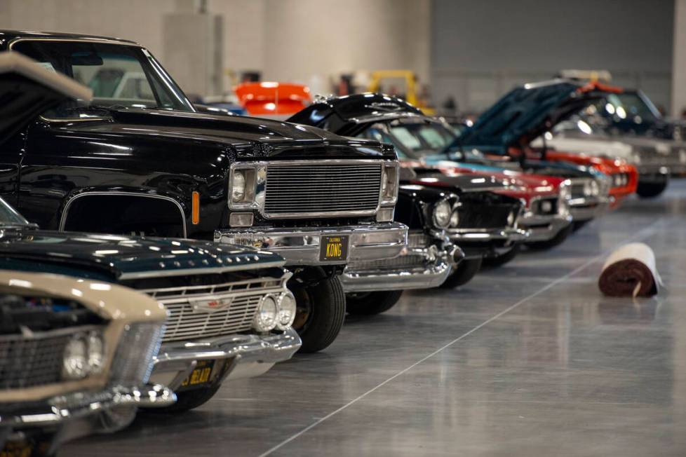 Cars line the convention hall floor for the Barrett-Jackson car auction at the Las Vegas Conven ...