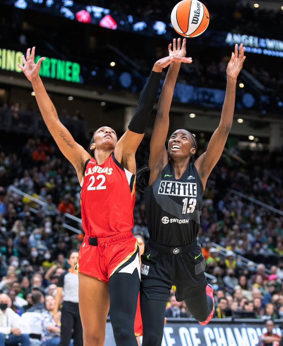 Seattle Storm's Ezi Macbegor, right, has her shot blocked by Las Vegas Aces' A'ja Wilson during ...