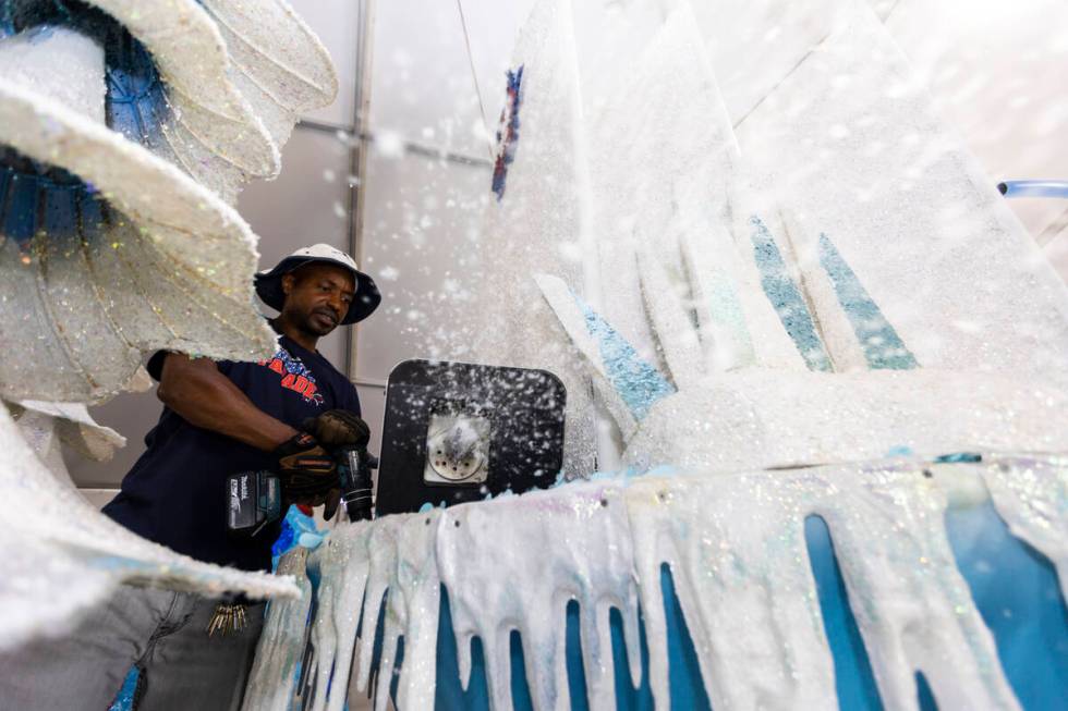 Maintenance coordinator Isiah Powell makes it snow from a float on display during a Summerlin P ...