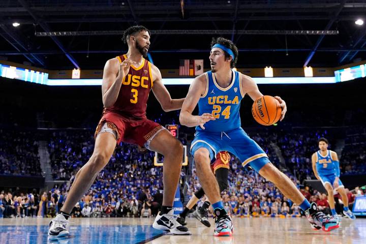 FILE - UCLA guard Jaime Jaquez Jr., right, tries to get by Southern California forward Isaiah M ...