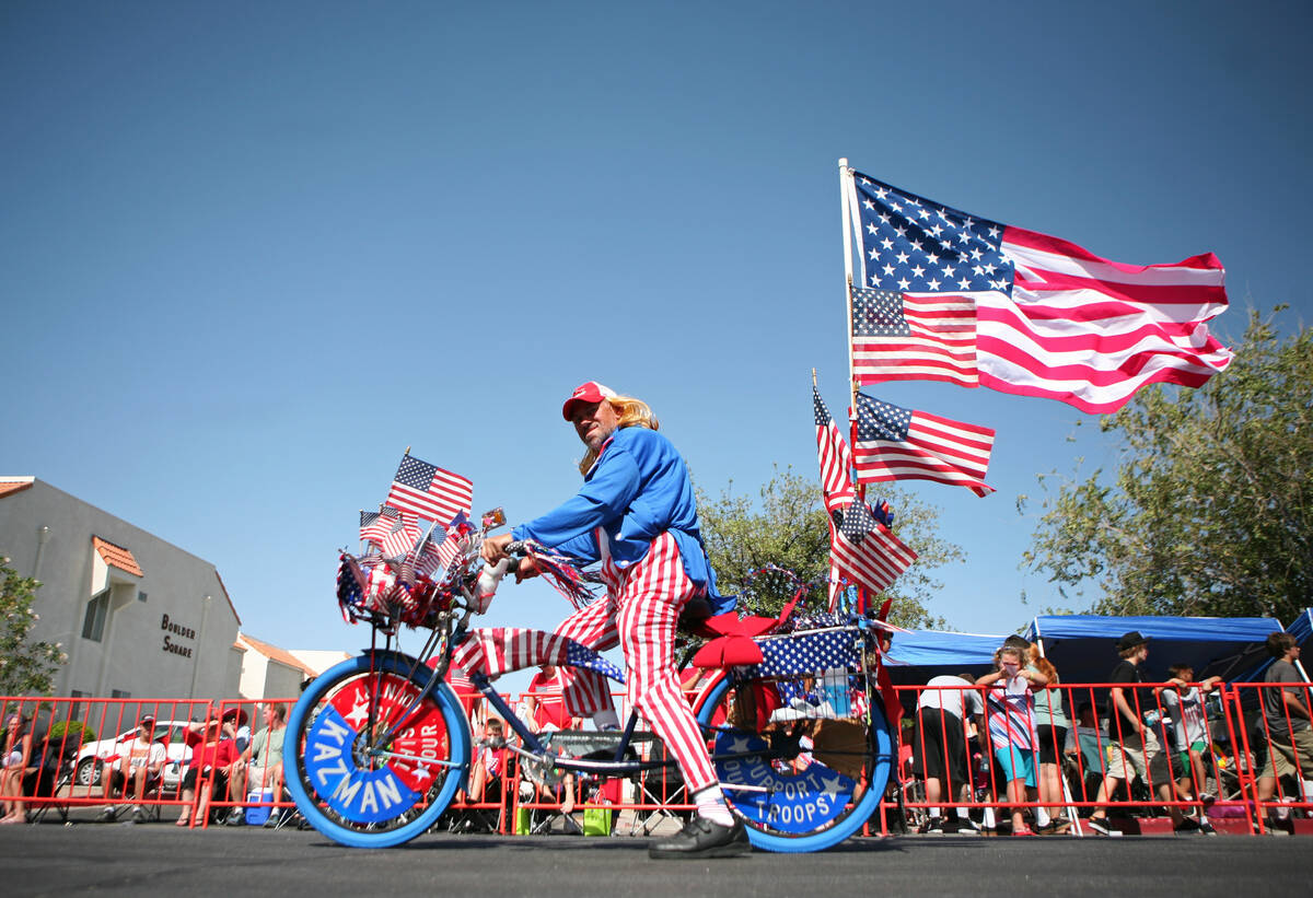 In this July 4, 2014, file photo, Casimer Kusak rides rides in the 66th Annual Boulder City Dam ...