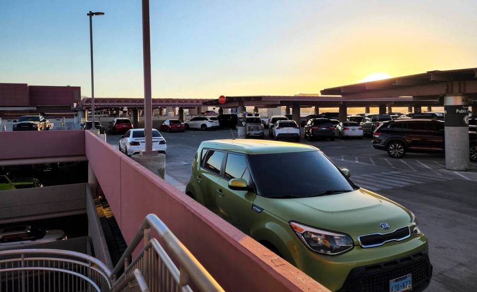 Cars fill up the top floor of long-term parking at Harry Reid International Airport on Wednesda ...