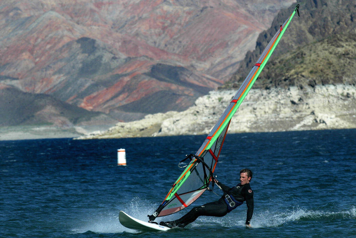 Joseph Demijohn of Las Vegas windsurfs at Lake Mead near Boulder Beach on April 4, 2003. (Clint ...