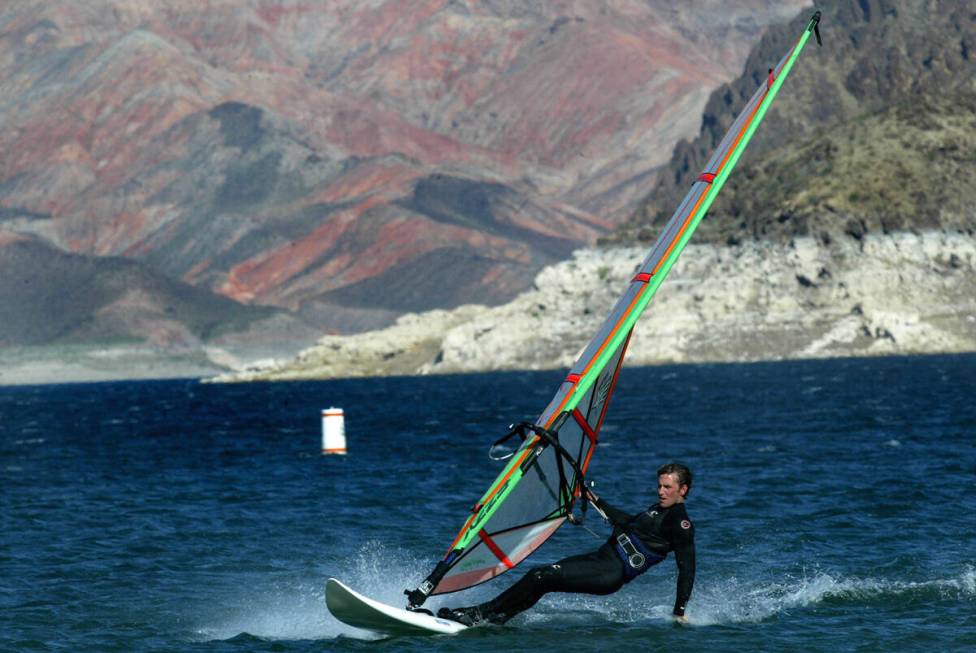 Joseph Demijohn of Las Vegas windsurfs at Lake Mead near Boulder Beach on April 4, 2003. (Clint ...