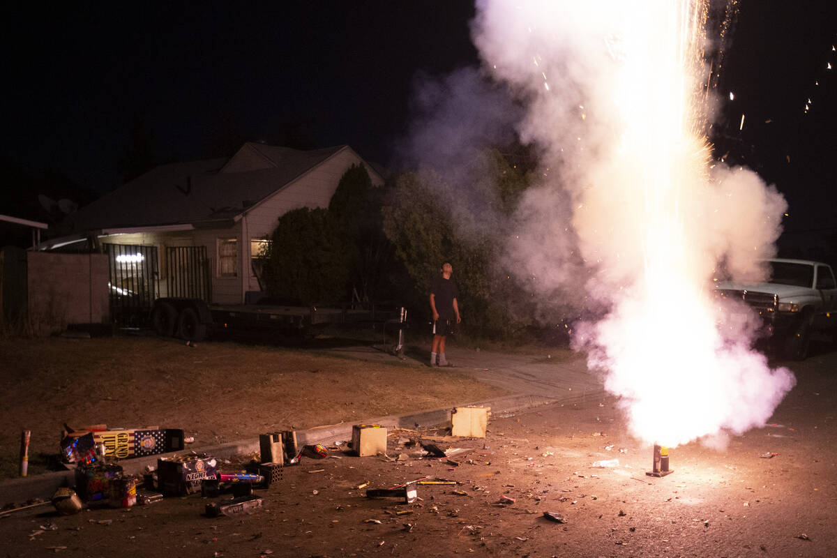 A group sets off illegal fireworks on their street to celebrate Independence Day on Saturday, J ...
