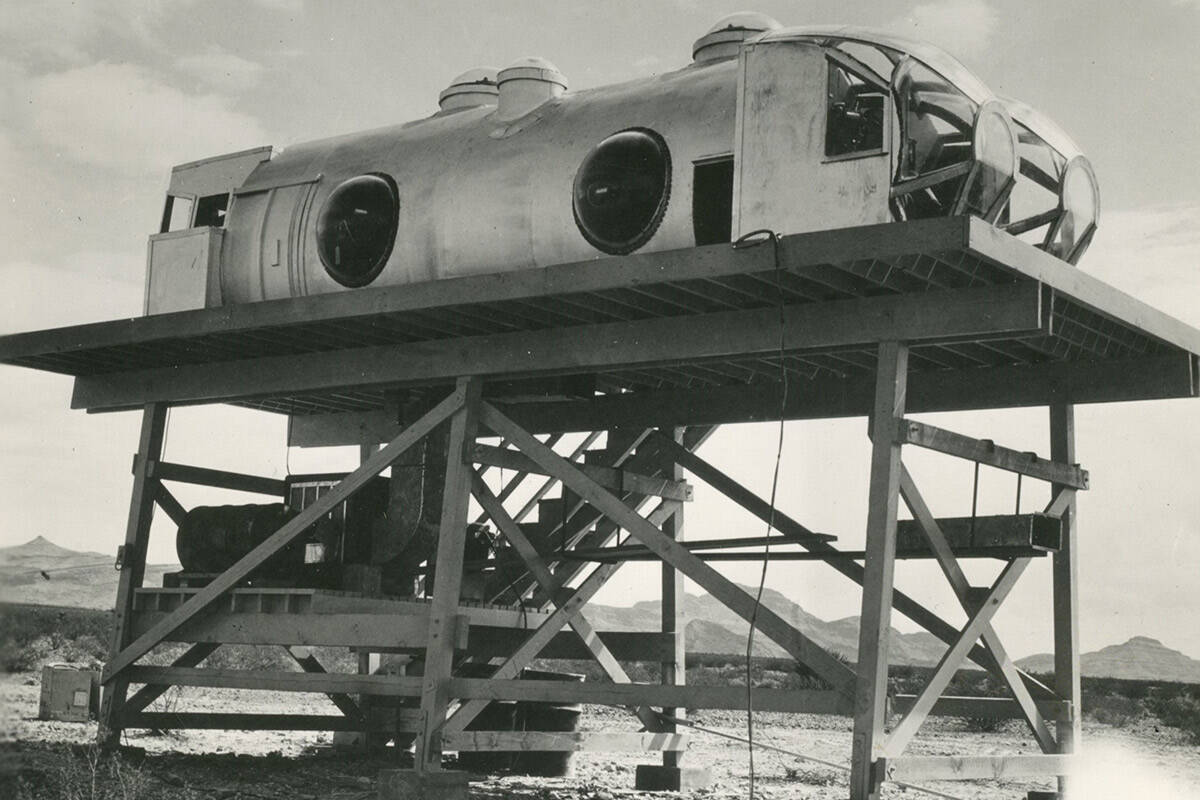 This elevated fuselage-type simulator was used to train gunners how to fire from a B-29 at the ...