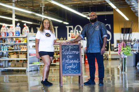 Co-owners of Artisanal Foods Jinelle Batista, left, stands with her husband, Chef Jon Batista, ...
