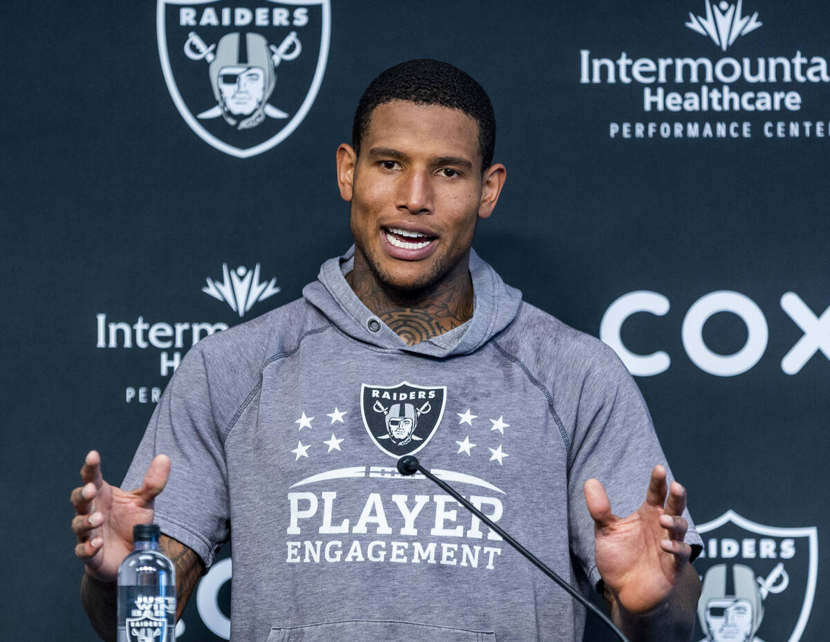 Raiders tight end Darren Waller talks during minicamp practice at the Raiders headquarters with ...