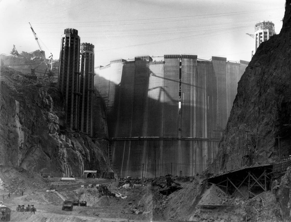 This is a view of the Hoover Dam from upstream as construction continues near Boulder City, Nev ...