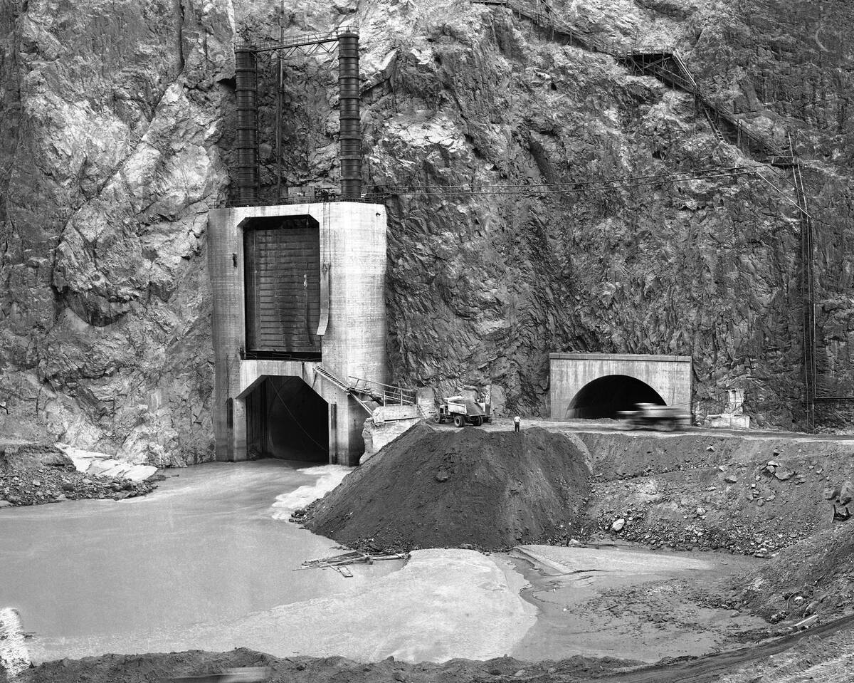 A three million pound gate of tunnel no. 4, shown above at left, was ready to close, Feb. 1, 19 ...