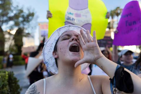 Maddy Caldwell, of Las Vegas, chants “my body, my choice,” during a rally for wom ...