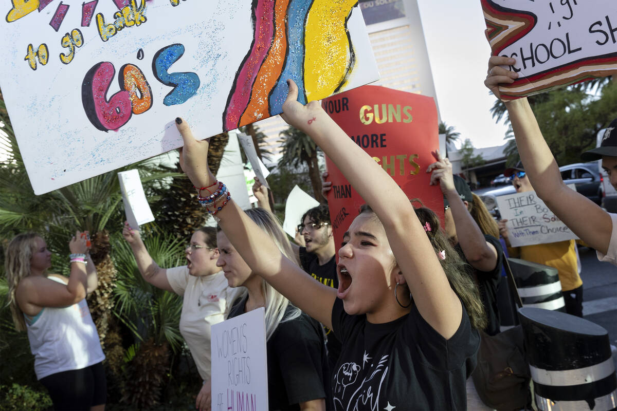 Tatyn Martinez, 12, joins in chanting during a rally for women’s rights, Friday, July 1, ...
