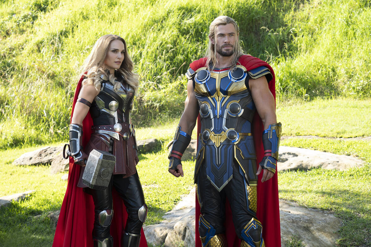 This image released by Marvel Studios shows Natalie Portman, left, and Chris Hemsworth in a sce ...