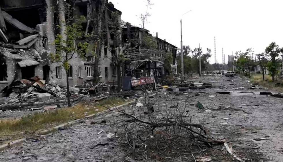 In this photo provided by the Luhansk region military administration, damaged residential build ...