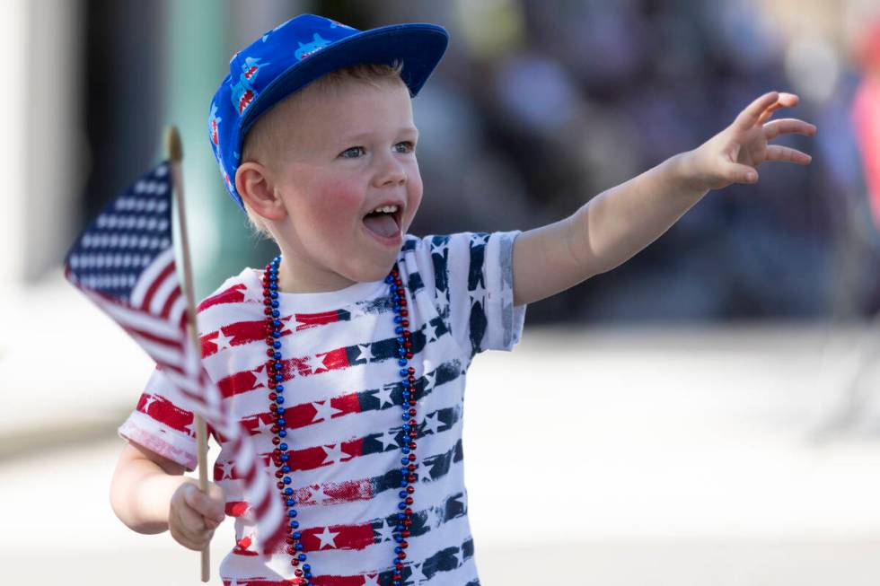 Ryker McArthur, 3, of Henderson, watches the Boulder City's 74th annual 4th of July Parade in B ...