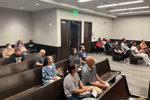 People wait to for their traffic ticket cases to be heard in traffic court at Las Vegas Municip ...