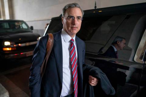 FILE - White House counsel Pat Cipollone departs the U.S. Capitol following defense arguments i ...