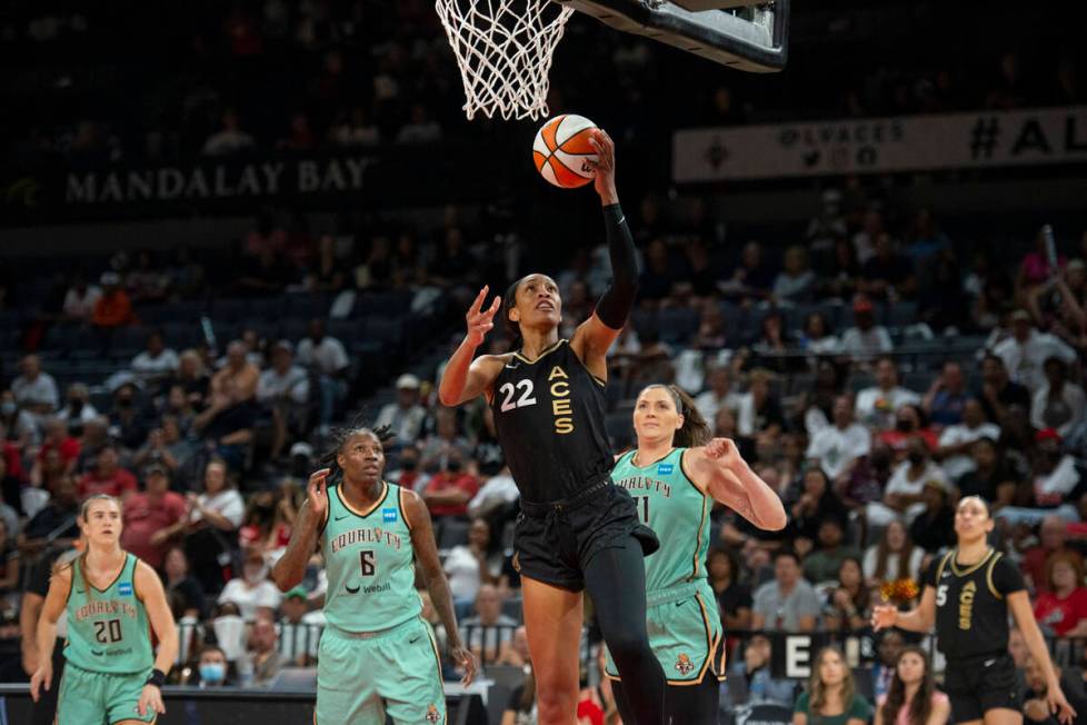 Las Vegas Aces forward A'ja Wilson (22) goes up for a shot against the New York Liberty at Mich ...