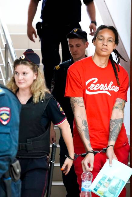 WNBA star and two-time Olympic gold medalist Brittney Griner is escorted to a courtroom for a h ...