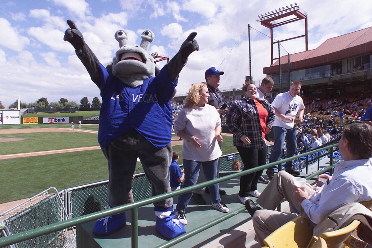 Las Vegas 51s mascot Cosmo dances with the crowd on opening day at Cashman Field on Thursday, A ...