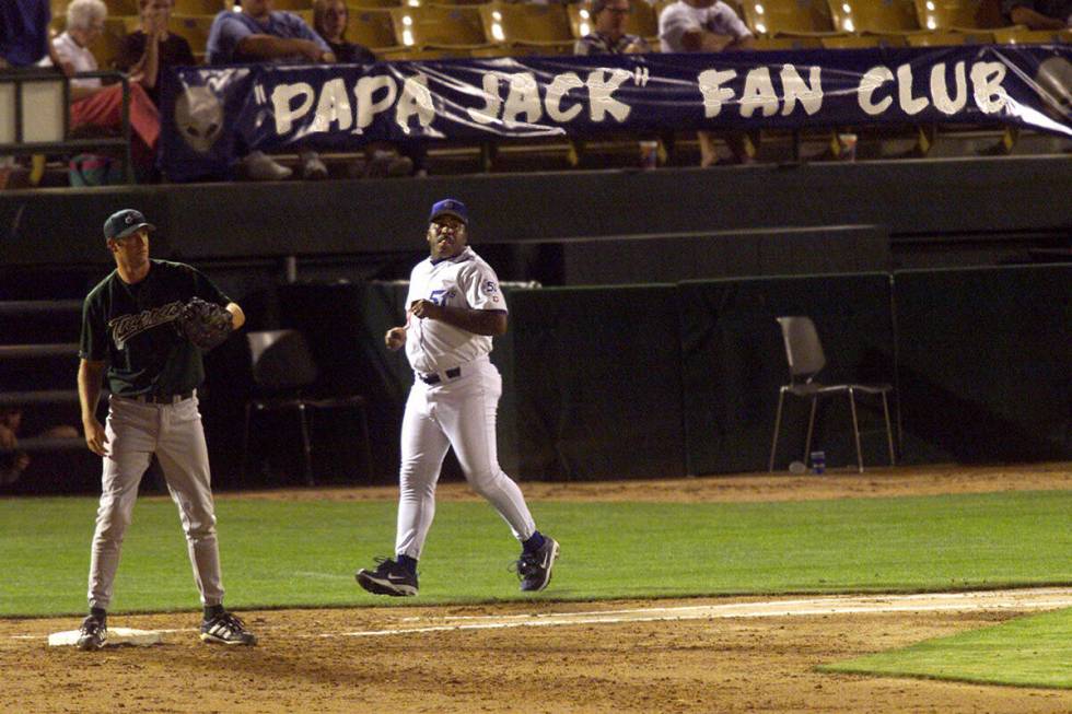 Las Vegas 51s first base coach Ron "Papa Jack" Jackson jogs out to his position as Edmonton Tra ...