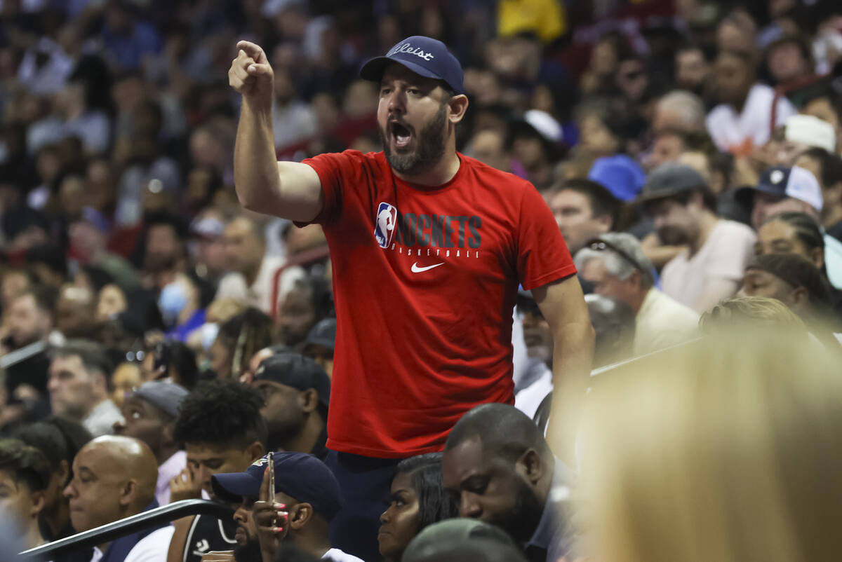 A Houston Rockets fan reacts as the team plays Orlando Magic during the first half of the first ...