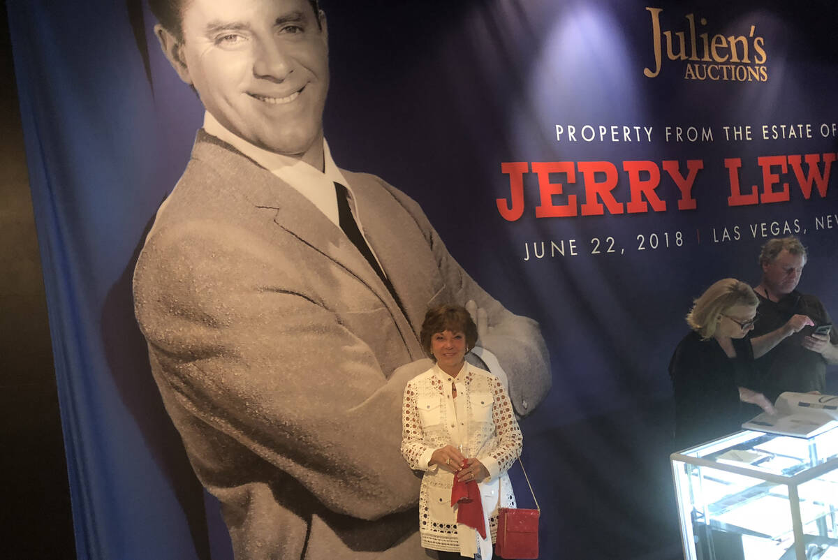 Sam Lewis is shown with and image of her late husband, entertainment legend Jerry Lewis, at Pla ...