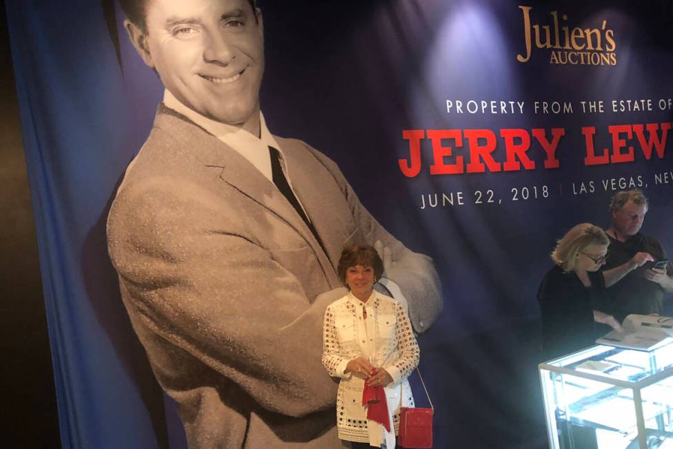 Sam Lewis is shown with and image of her late husband, entertainment legend Jerry Lewis, at Pla ...