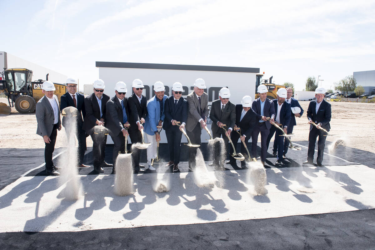 Project partners and guests pose for a photo during the groundbreaking for the Dream Las Vegas ...