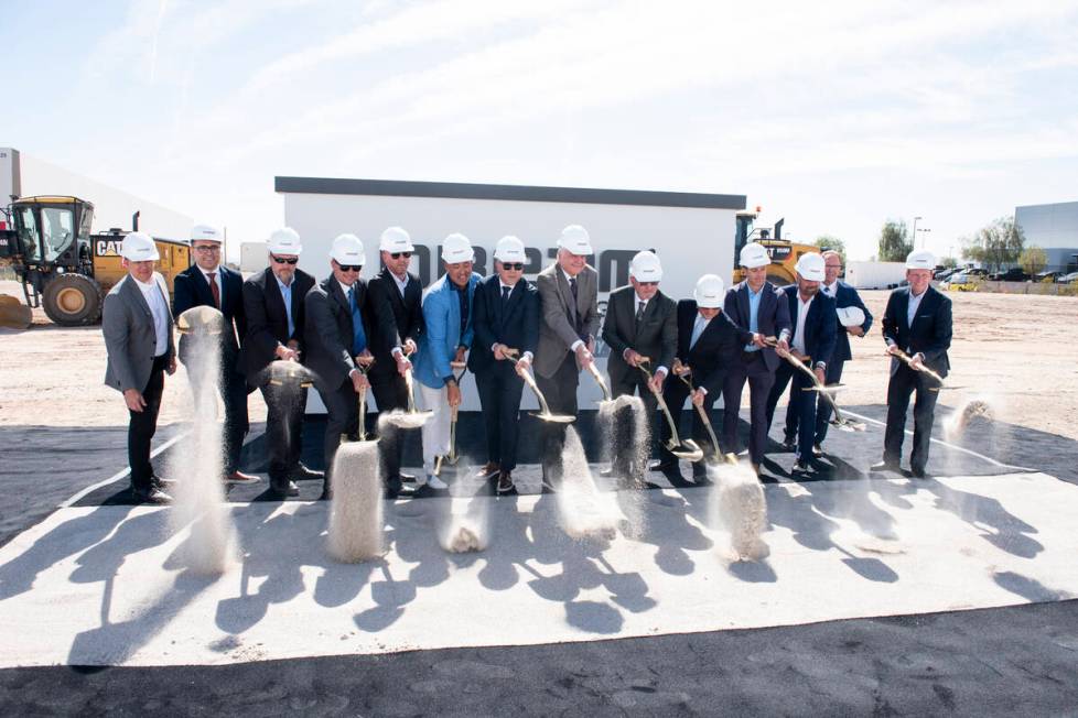 Project partners and guests pose for a photo during the groundbreaking for the Dream Las Vegas ...