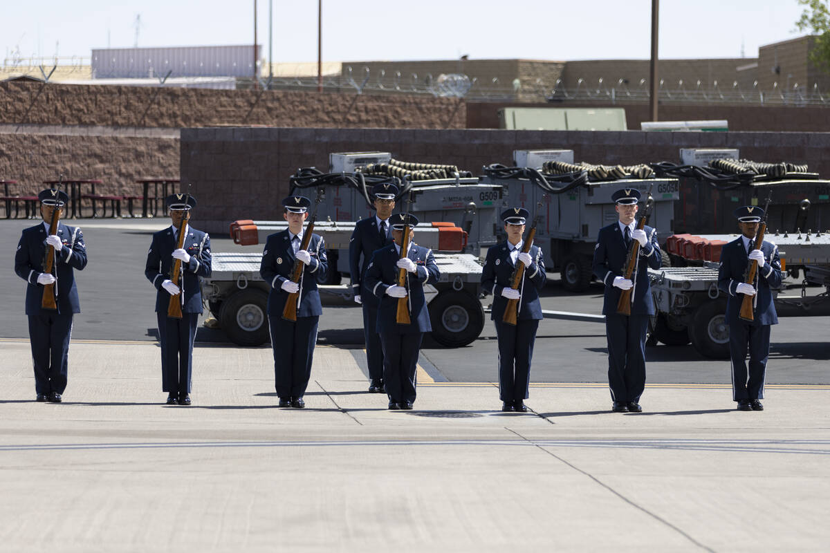 Members of the Nellis Air Force Base honor guard participate during a memorial service for Broo ...